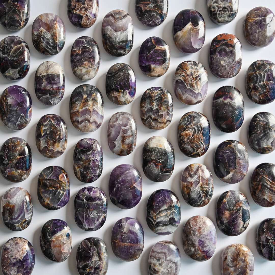 Amethyst Palm Stones placed on table