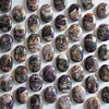 Load image into Gallery viewer, Amethyst Palm Stones placed on table