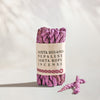 Austa Suganda Lokta Rope Incense Bundle: lilac twisted rope incense in a kraft paper band, two loose ropes beside it.