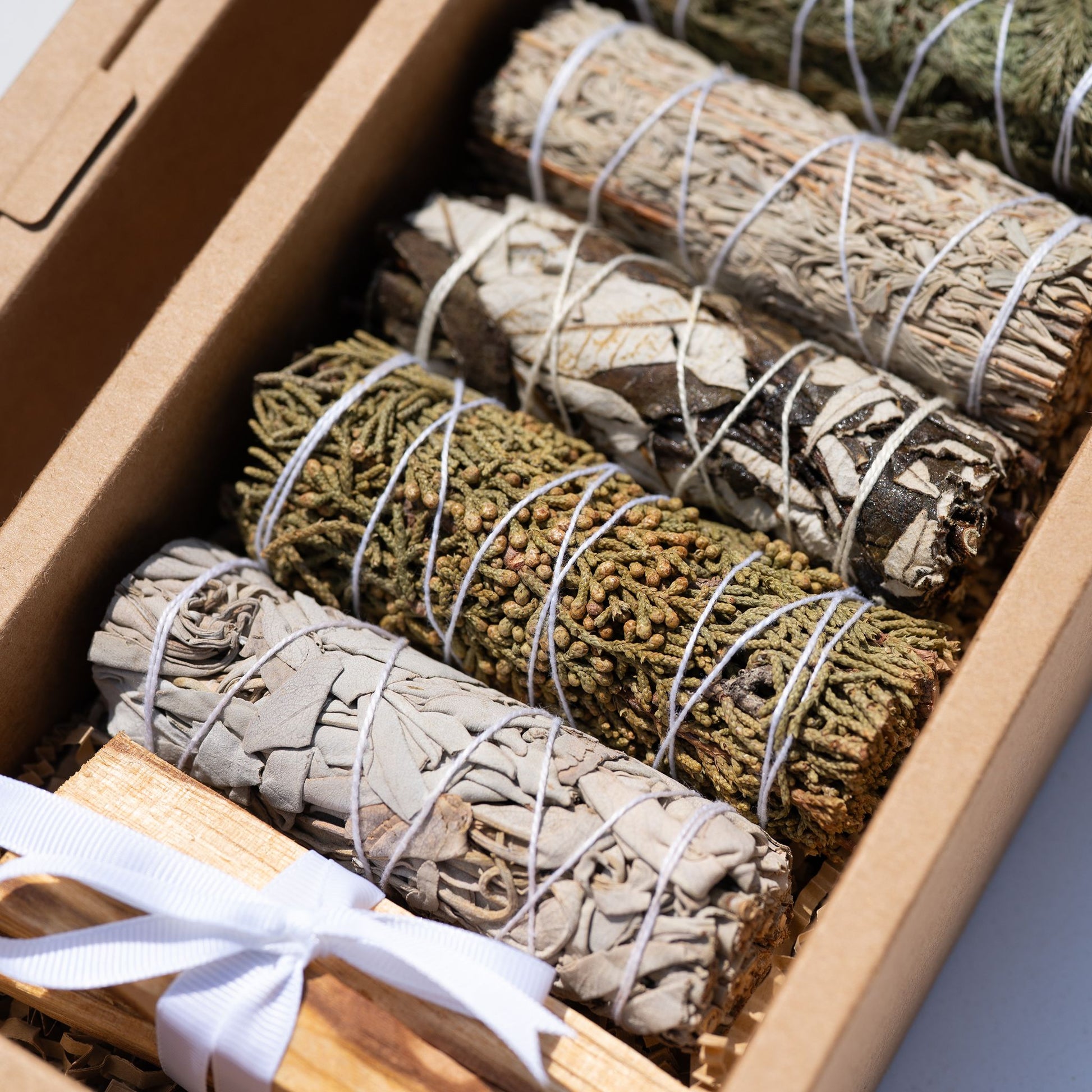 white sage, blue sage, cedar, yerba sanda