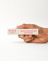 Hand holding Nag Champa Incenses 