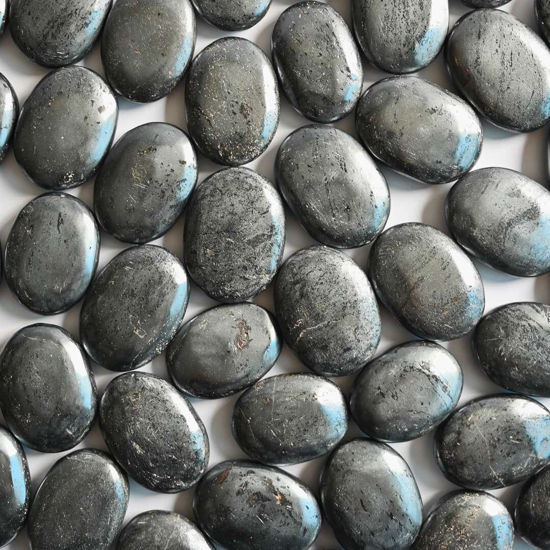 Hematite Palm Stone placed together
