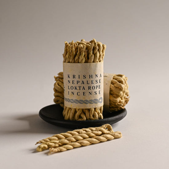 Krishna Nepalese Lokta Rope Incense on a Clay holder