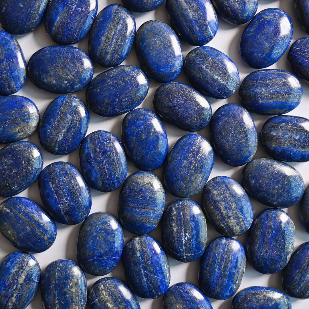 Lapis Lazuli Palm Stones placed together