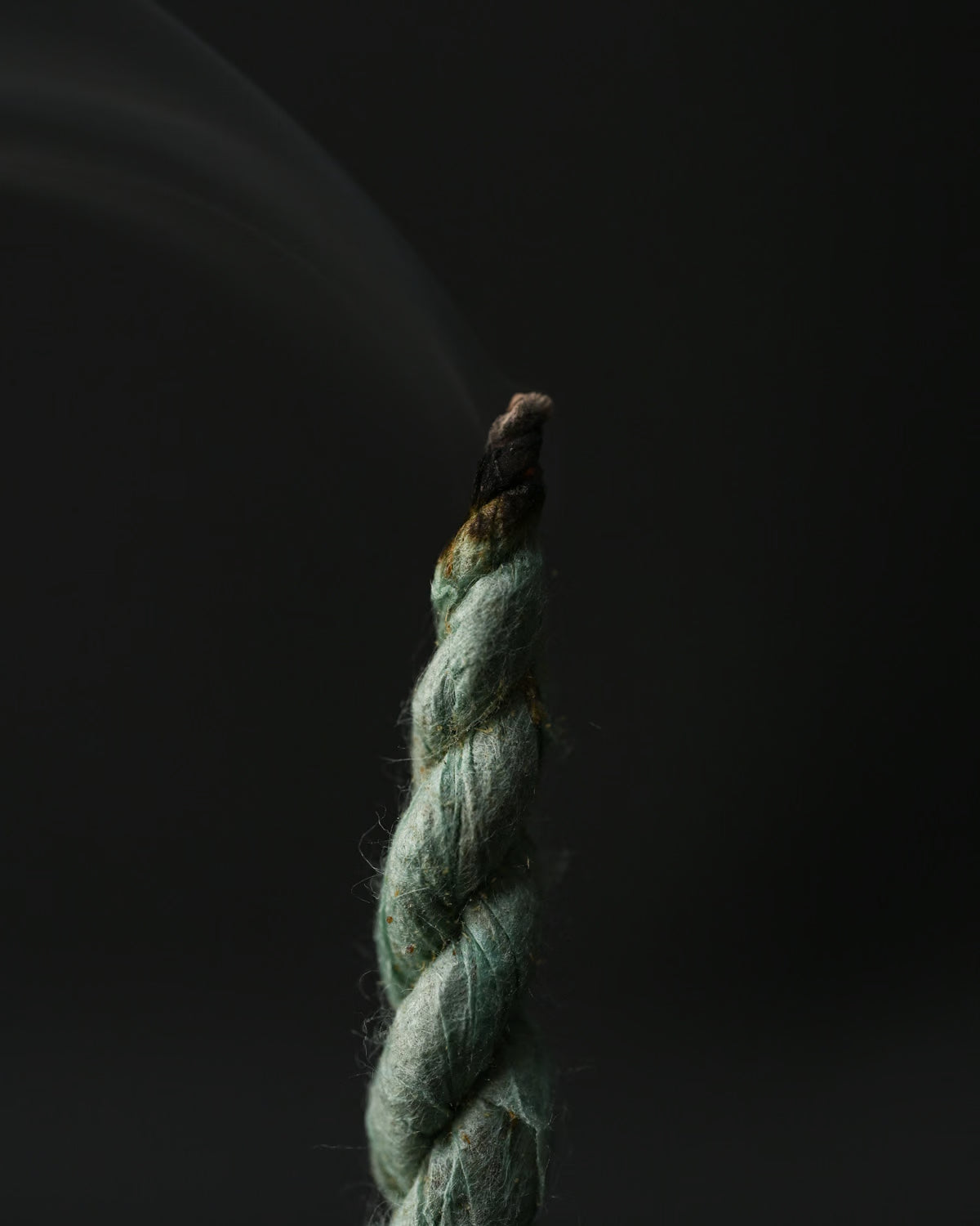 Macro shot of Devdar Lokta Rope Incense Tube