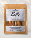 Front of a kraft pouch of Maison Éthérique Palo Santo, five hand-cut sticks visible through a clear window, on a pale background.