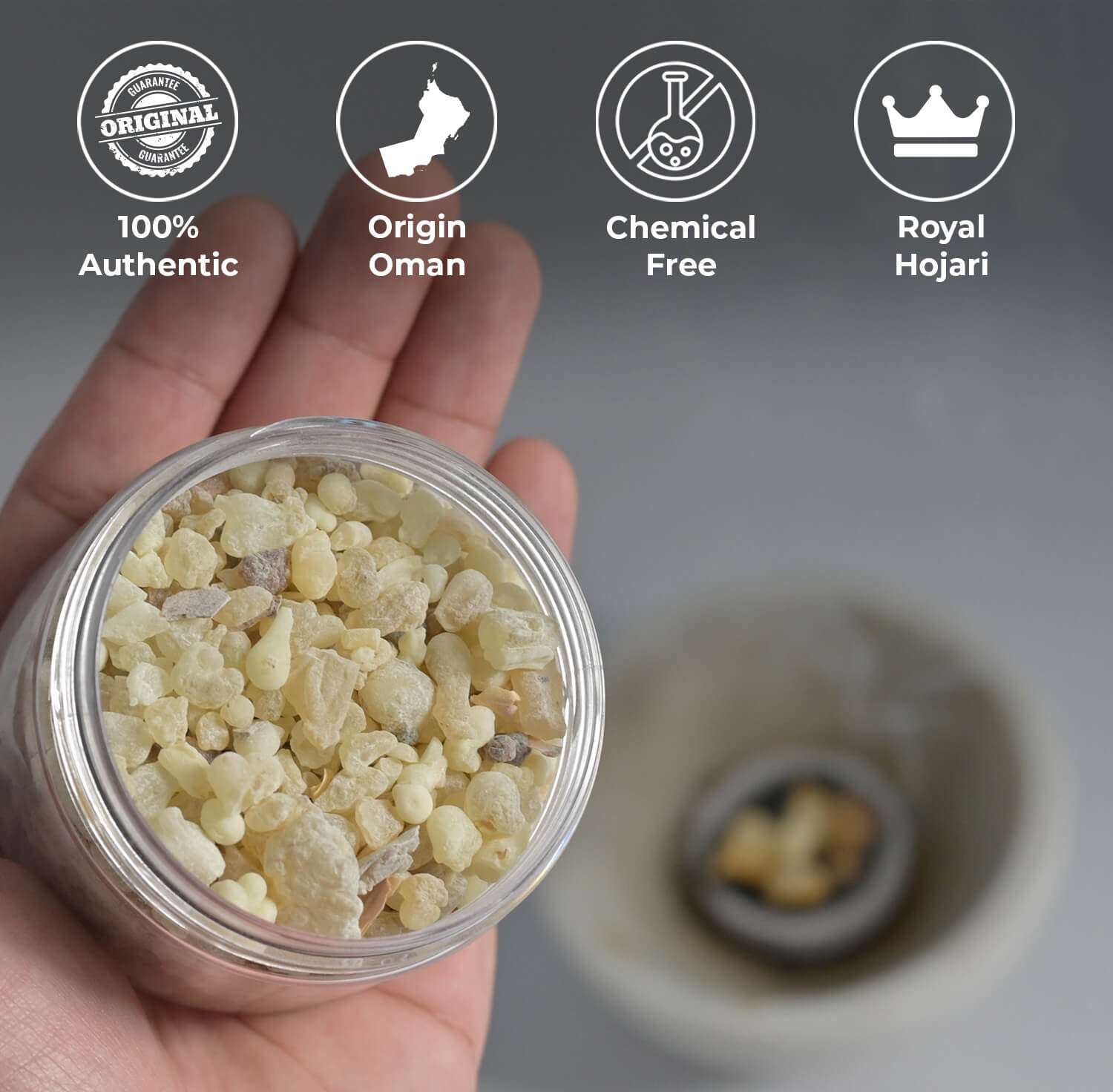 A jar of frankincense shown by hand