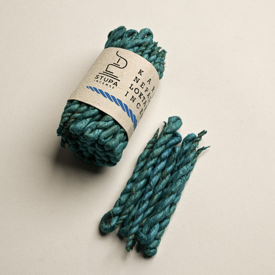 Bundle sticks of karma rope incense