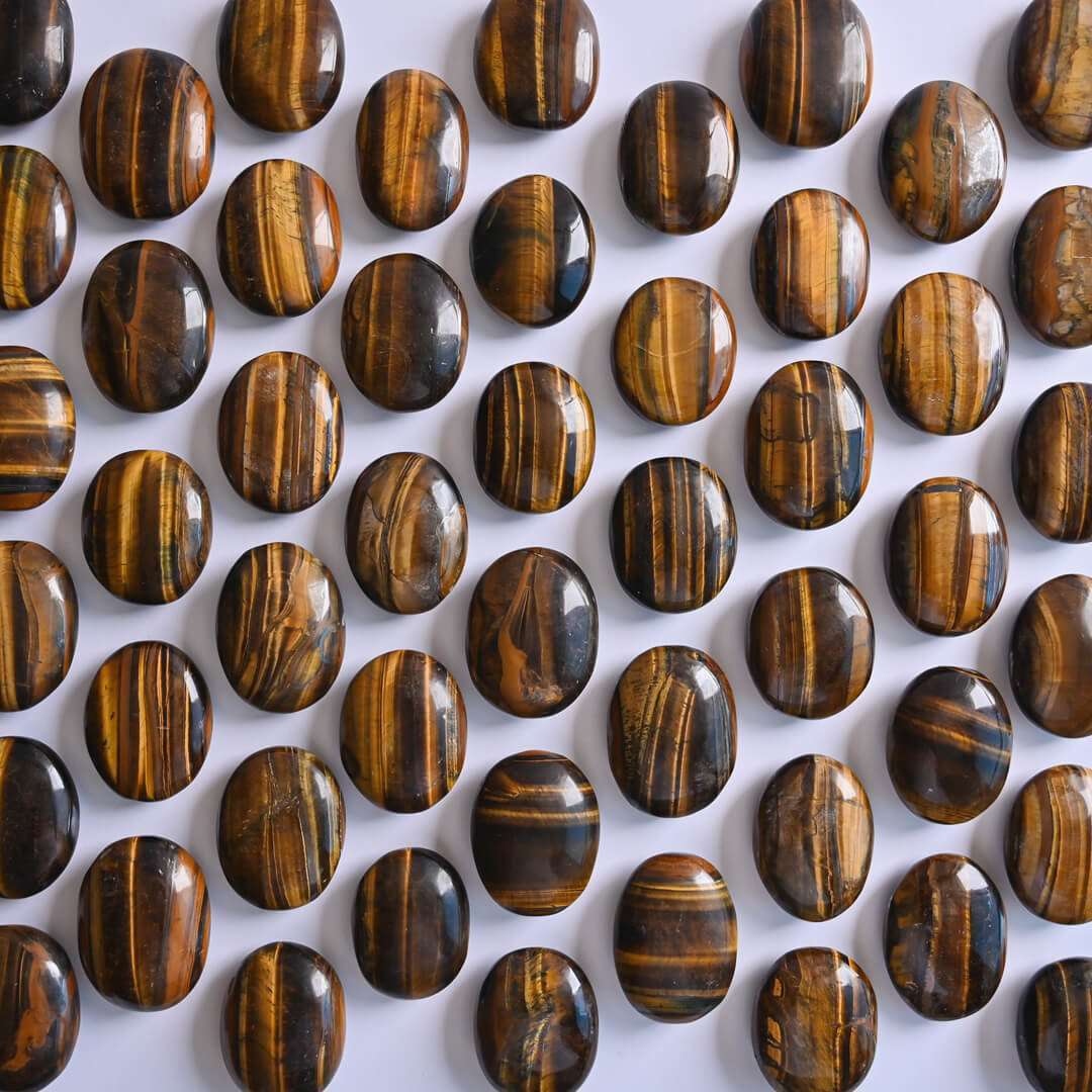 Tiger's Eye Palm Stones placed together