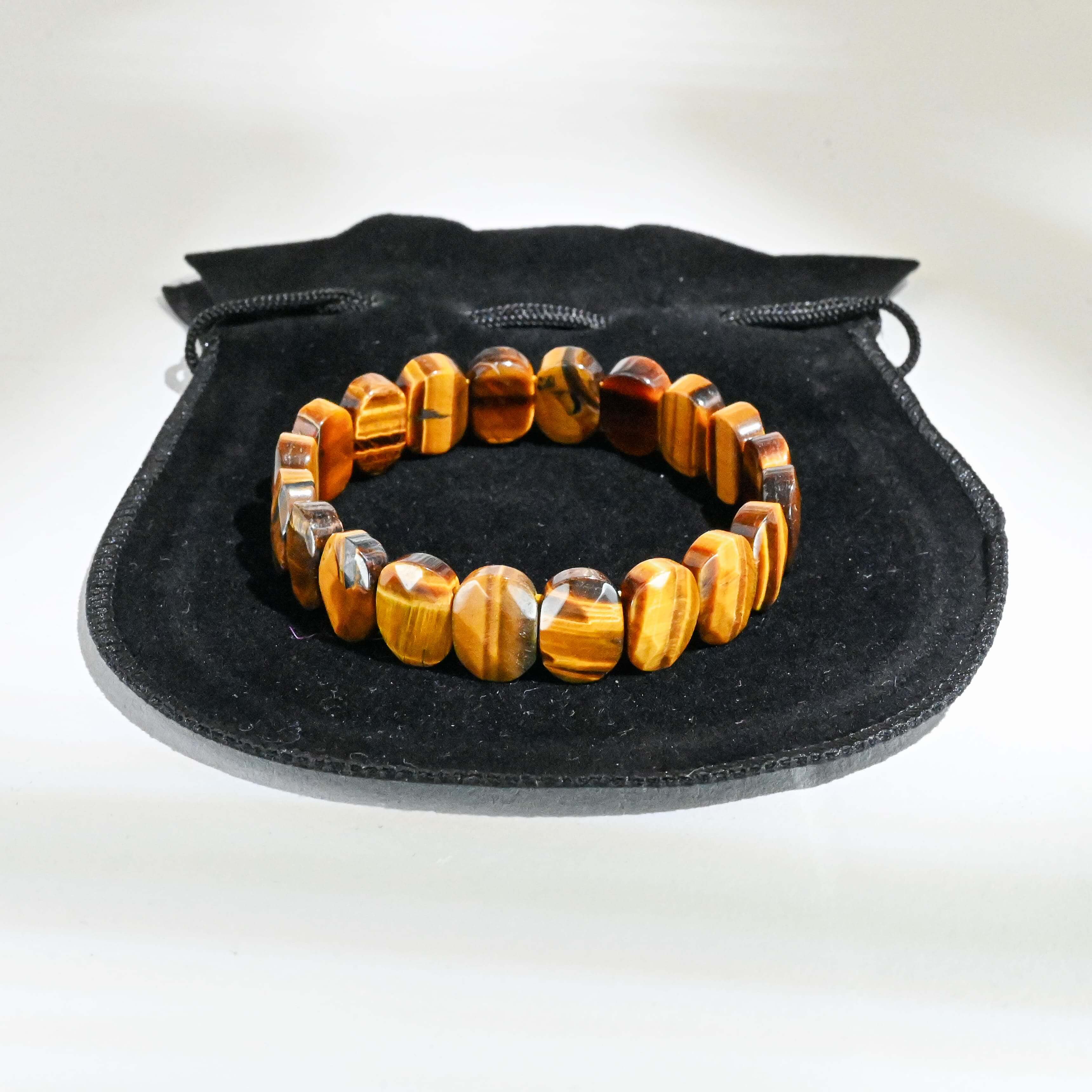 tiger-eye-faceted-bracelet-placed-on-a-pouch