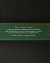 Side of the green Padma Tibetan incense box with printed gold text, on a dark background.