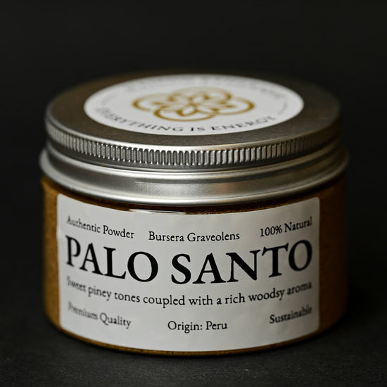 Round tin of Maison Éthérique Palo Santo powder (Bursera graveolens) from Peru with a silver lid, on a dark background.