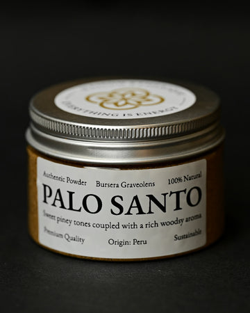 Round tin of Maison Éthérique Palo Santo powder (Bursera graveolens) from Peru with a silver lid, on a dark background.