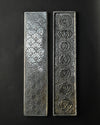 Back and front of the 7 Chakra metal incense stick holder side by side, showing the embossed fan pattern and seven symbols.