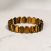 Close-up of a Tiger Eye faceted bracelet showcasing its earthy tones, golden flashes, and intricate bead cuts.