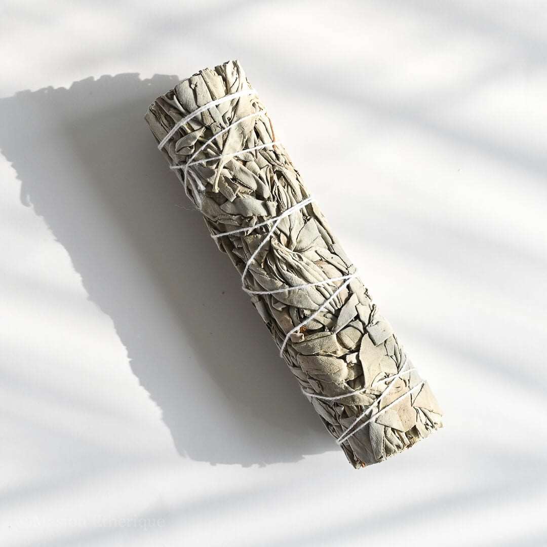 White Sage Smudge Stick placed by the window