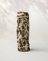 Yerba santa smudge stick (Eriodictyon californicum) standing upright, bound with white string, on a pale surface.