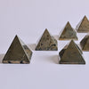 Pyrite Pyramid placed on white surface