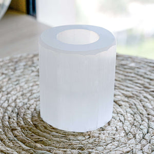 Selenite Crystal Candle Holder on a side table